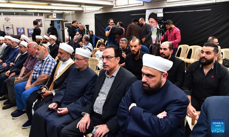 People gather at the Iranian embassy in Syria in Damascus, Syria, to offer condolences for the victims of the helicopter crash near Varzaqan County, Iran, on May 21, 2024. Iranian President Ebrahim Raisi and some members of his accompanying team, including Foreign Minister Hossein Amir-Abdollahian, were confirmed dead Monday morning as the wreckage of the helicopter carrying them was found following its crash in bad weather on Sunday near Varzaqan County, some 670 km away from Tehran.(Photo: Xinhua)