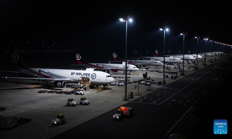 This photo taken on May 25, 2024 shows a view of the Ezhou Huahu Airport in Ezhou, central China's Hubei Province. The Ezhou Huahu Airport, an all-cargo hub airport starting operations in July 2022, is now running 48 domestic routes and 17 international routes. The airport owns a 750,000-square meter cargo transfer center with parcel sorting lines adding up to 52 kilometers, and its international throughput has exceeded 80,000 tonnes. (Photo:Xinhua)