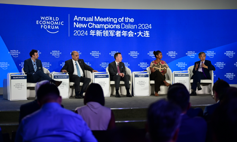 Speakers at a panel discussion titled