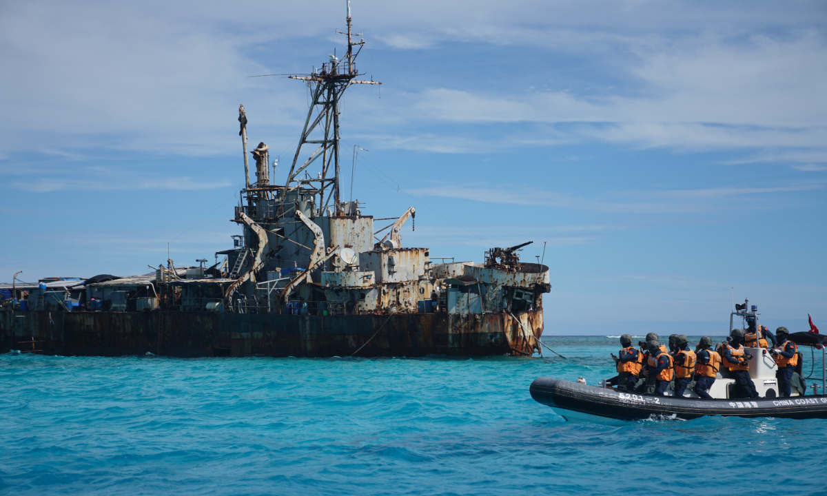 The China Coast Guard recaptures Chinese fishermen’s fishing net stolen by the Filipinos near the Philippines’ warship illegally grounded at China’s Ren’ai Jiao in the South China Sea. Photo: Courtesy of the China Coast Guard