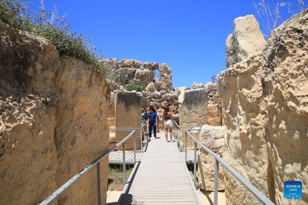 People visit the Ggantija Temples, a UNESCO world heritage complex on Gozo Island, Malta, May 26, 2024.(Photo: Xinhua)