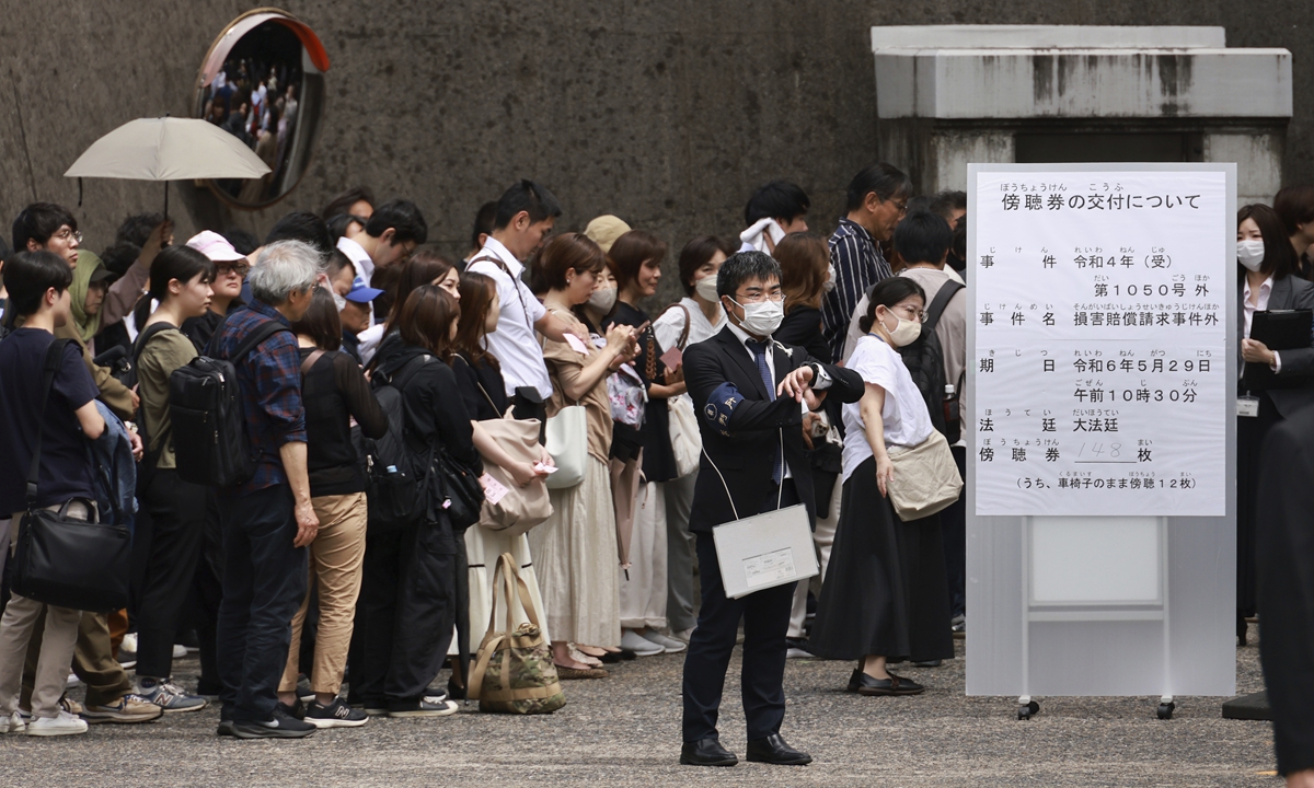 
People wait in a long line to listen to an appeal in the Supreme Court in Tokyo on the issue of forced sterilization of people with disabilities based on the now-defunct Eugenic Protection Law on May 29, 2024. The law was enacted in 1948 to prevent a birth of defective offspring in Japan and continued until it was amended to the Maternal Protection Act in 1996. Photo: VCG