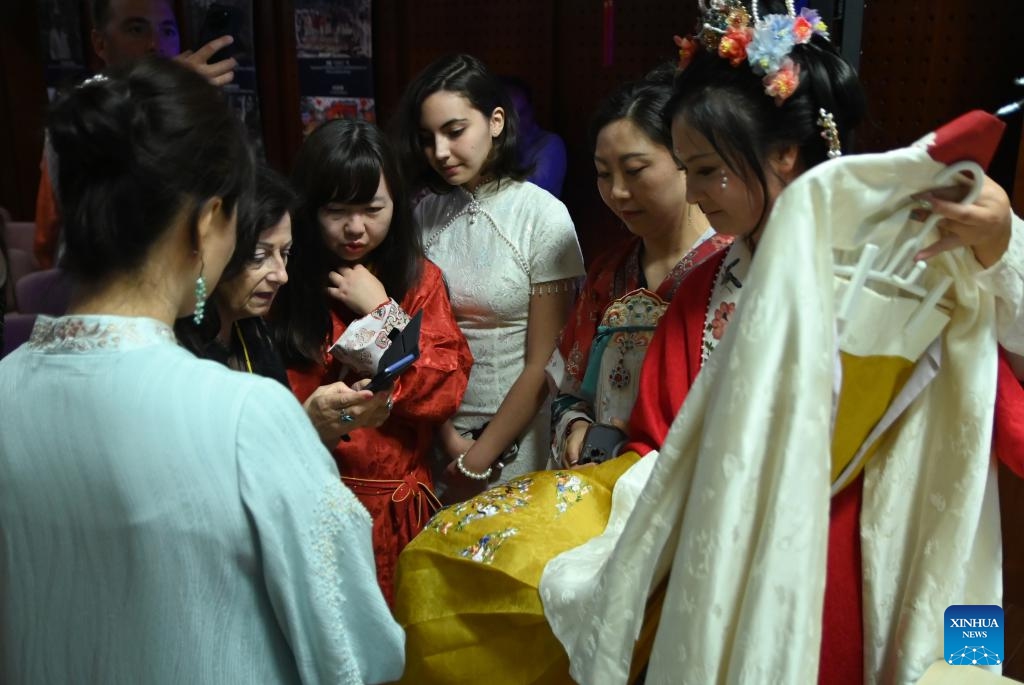 People view a suit of traditional Chinese costumes in Valletta, capital of Malta, on May 27, 2024.(Photo: Xinhua)