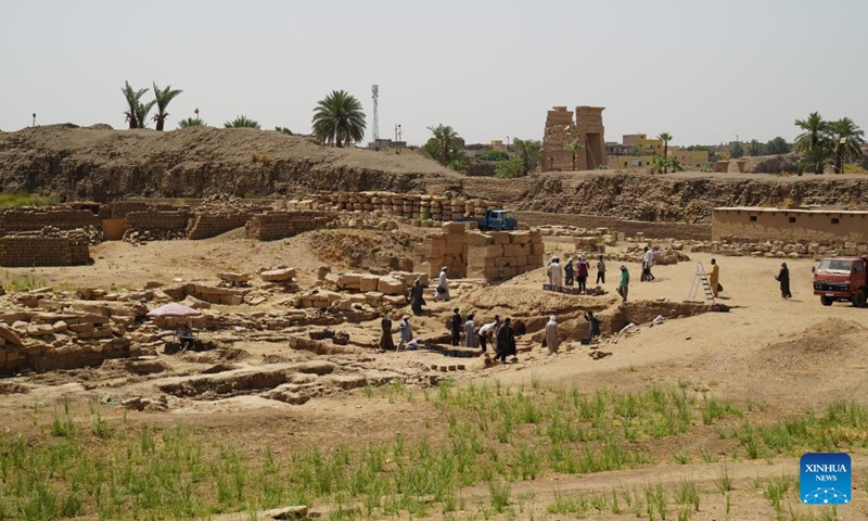 Archaeologists of a Chinese-Egyptian archaeological mission work at the excavation site of the Montu Temple in Luxor, Egypt, on April 28, 2024. The Montu Temple, located at the Karnak Temple Complex of Egypt's monument-rich city of Luxor, was dedicated to the worship of Montu, a falcon-headed war god.(Photo: Xinhua)