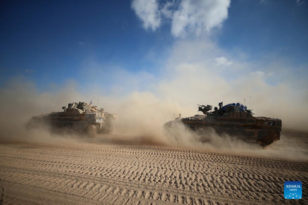 Israeli troops are seen near the border with Gaza Strip, in southern Israel, on May 29, 2024. The Israeli army announced on Wednesday that it has gained full operational control of the Philadelphi Corridor, a strip of land along the border between Egypt and the southern Gaza Strip.(Photo: Xinhua)