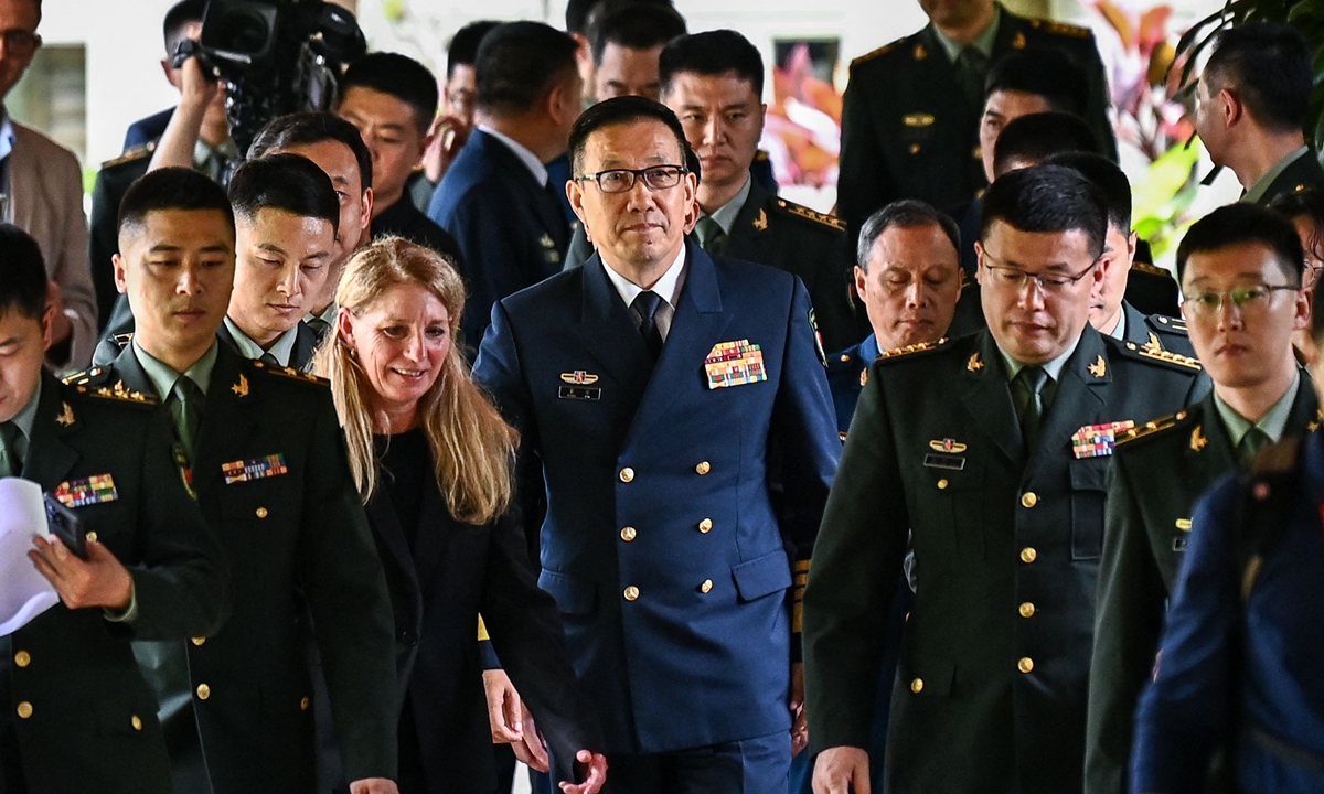 Chinese Defense Minister Dong Jun (center) walks out after a bilateral meeting with US Secretary of Defense Lloyd Austin on the sidelines of the 21st Shangri-La Dialogue in Singapore on May 31, 2024. Photo: VCG