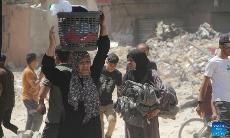 Displaced Palestinians are seen in Jabalia, northern Gaza Strip, on May 30, 2024. Local sources reported that Israeli troops have withdrawn from the western and southern regions of Jabalia in northern Gaza, while some soldiers remain in the northern and eastern areas of the city. In a statement, the emergency committee in the northern Gaza Strip urged residents to be patient and not return to the northern areas of the Gaza Strip at this time. (Photo: Xinhua)