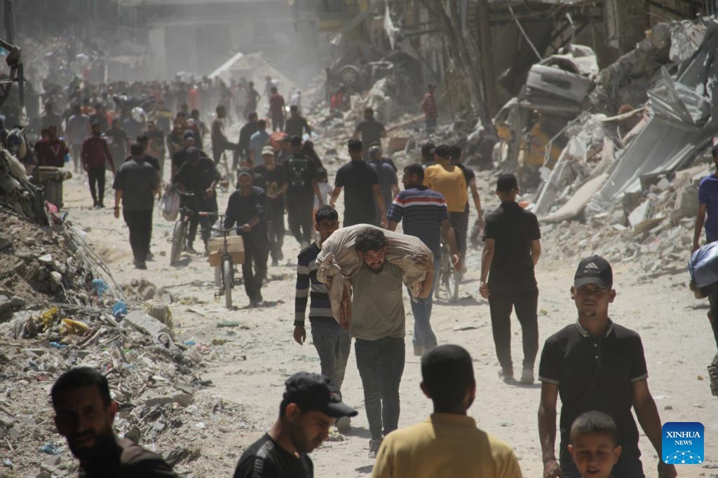 Displaced Palestinians are seen in Jabalia, northern Gaza Strip, on May 30, 2024. Local sources reported that Israeli troops have withdrawn from the western and southern regions of Jabalia in northern Gaza, while some soldiers remain in the northern and eastern areas of the city. In a statement, the emergency committee in the northern Gaza Strip urged residents to be patient and not return to the northern areas of the Gaza Strip at this time. (Photo: Xinhua)