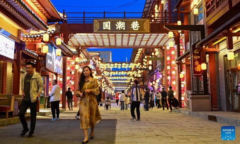People visit a night market in Emin County, Tacheng Prefecture, northwest China's Xinjiang Uygur Autonomous Region, May 29, 2024, Xinjiang in northwest China has entered its peak tourism season recently. Emin County, located near the China-Kazakhstan border, is a popular tourist destination which provides various rural tour routes and cultural events. (Photo: Xinhua)