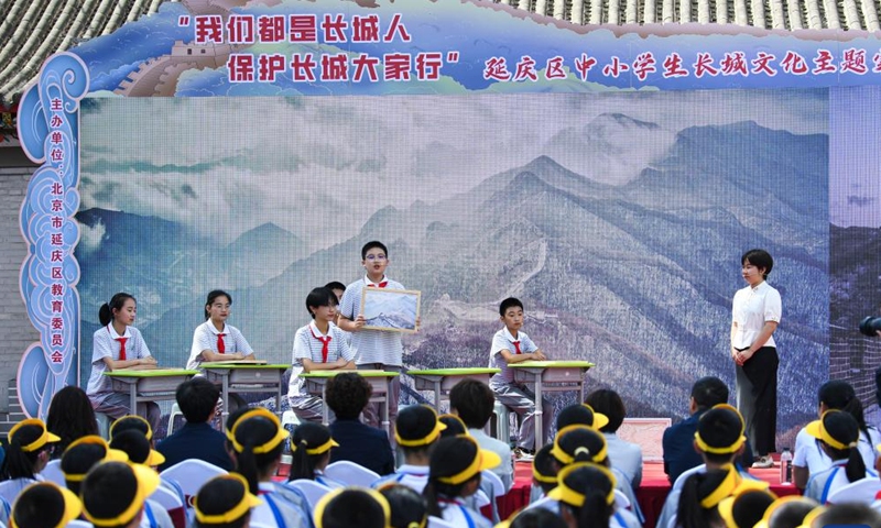 An activity for primary and secondary school students themed on the Great Wall culture is held in Shixia Village in Yanqing District of Beijing, capital of China, May 31, 2024. Shixia Village in Yanqing District of Beijing was first built in the Ming Dynasty (1368-1644) and was once an important pass in the north of Juyongguan section of the Great Wall. (Photo: Xinhua)