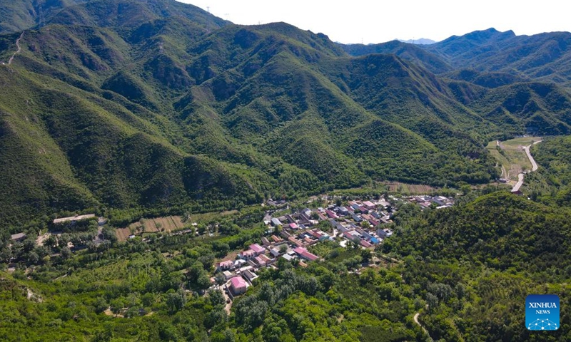 An aerial drone photo taken on June 1, 2024 shows the Shixia Village in Yanqing District of Beijing, capital of China. Shixia Village in Yanqing District of Beijing was first built in the Ming Dynasty (1368-1644) and was once an important pass in the north of Juyongguan section of the Great Wall. (Photo: Xinhua)