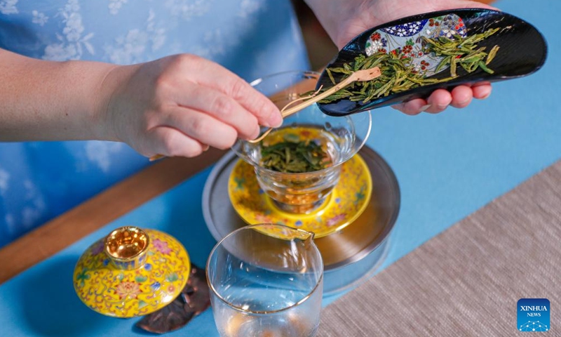Wang Sun makes tea at Demingshe, a tea art vocational training school in Huangshan City, east China's Anhui Province, May 23, 2024. (Photo: Xinhua)