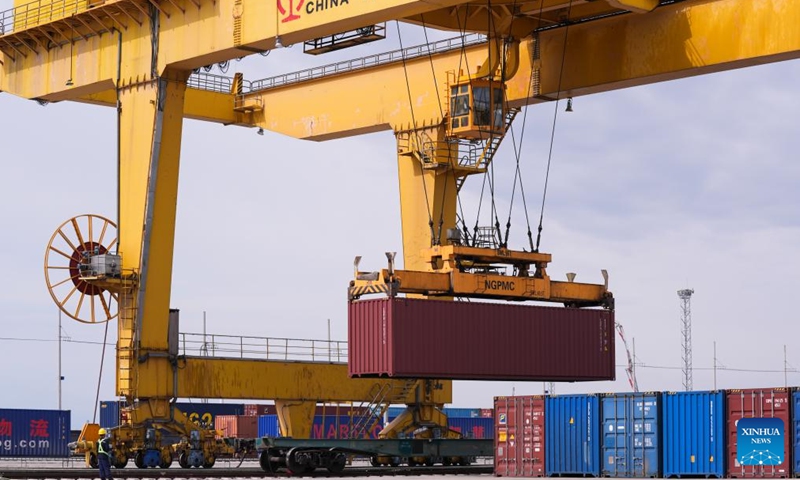 This photo taken on May 29, 2024 shows a view of the load-transfer yard of Horgos Port in Horgos, northwest China's Xinjiang Uygur Autonomous Region. The Horgos Port and the Alataw Pass, two major railway ports in northwest China's Xinjiang Uygur Autonomous Region, have handled more than 6,400 China-Europe (Central Asia) freight train trips since the beginning of this year, according to China Railway Urumqi Group Co., Ltd. (Photo: Xinhua)
