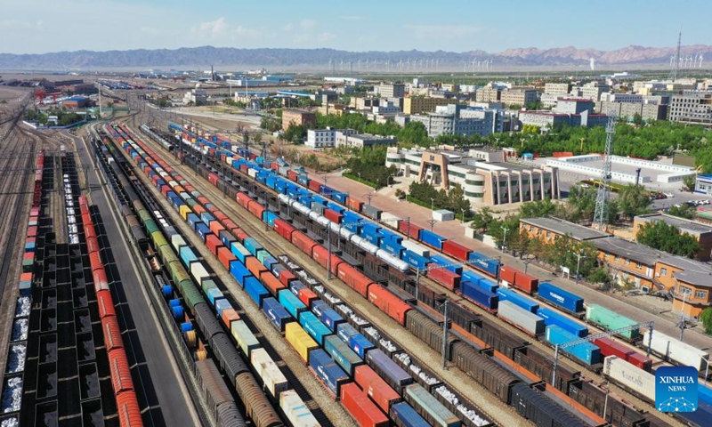 A drone photo taken on May 25, 2024 shows freight trains waiting for departure at the Alataw Pass in northwest China's Xinjiang Uygur Autonomous Region. The Horgos Port and the Alataw Pass, two major railway ports in northwest China's Xinjiang Uygur Autonomous Region, have handled more than 6,400 China-Europe (Central Asia) freight train trips since the beginning of this year, according to China Railway Urumqi Group Co., Ltd. (Photo: Xinhua)