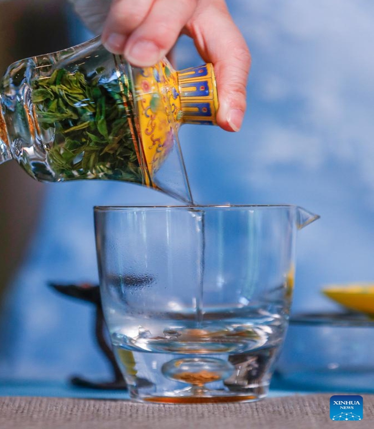 Wang Sun makes tea at Demingshe, a tea art vocational training school in Huangshan City, east China's Anhui Province, May 23, 2024. (Photo: Xinhua)