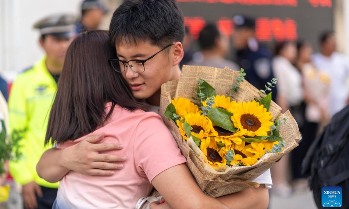 A student hugs his mother after the exam at a national college entrance examination site in Dali Bai Autonomous Prefecture, southwest China's Yunnan Province, June 8, 2024. China's annual national college entrance examination, also known as Gaokao, started on Friday. The exam in some regions has ended on Saturday. (Photo by Luo Xincai/Xinhua)


