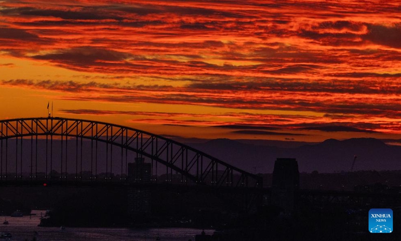 This photo taken on June 9, 2024 shows sunset view of Harbor Bridge in Sydney, Australia. (Photo: Xinhua)