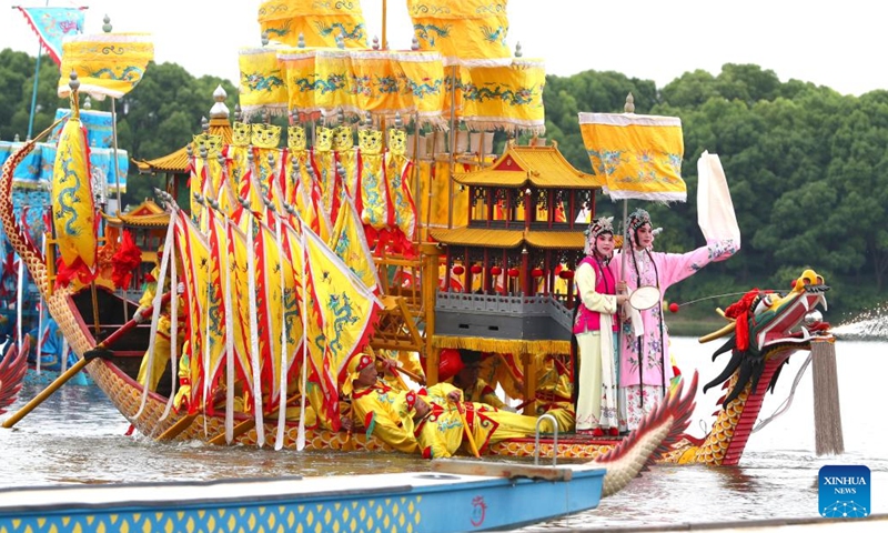 This photo taken on June 7, 2024 shows a scene of the dragon boat performance during the Baoshan Luodian dragon boat festival in east China's Shanghai. (Photo: Xinhua)