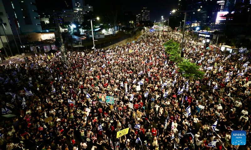 People take part in a demonstration in demand of an immediate ceasefire in Gaza and a deal for the release of the remaining hostages held by Hamas, in Tel Aviv, Israel on June 8, 2024. (Photo: Xinhua)