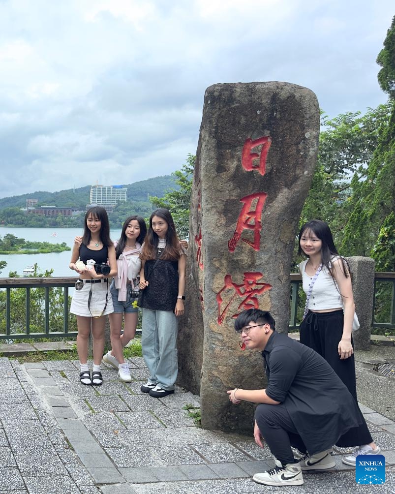 Tourists visit the scenic spot of Riyue Tan, or the Sun Moon Lake, during the holiday of the Dragon Boat Festival, also called Duanwu Festival, in Nantou County, southeast China's Taiwan, June 9, 2024. (Photo: Xinhua)
