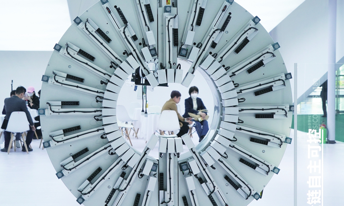 People converse at the World Health Expo in Wuhan, Central China's Hubei province, on April 7, 2023.Photo:VCG