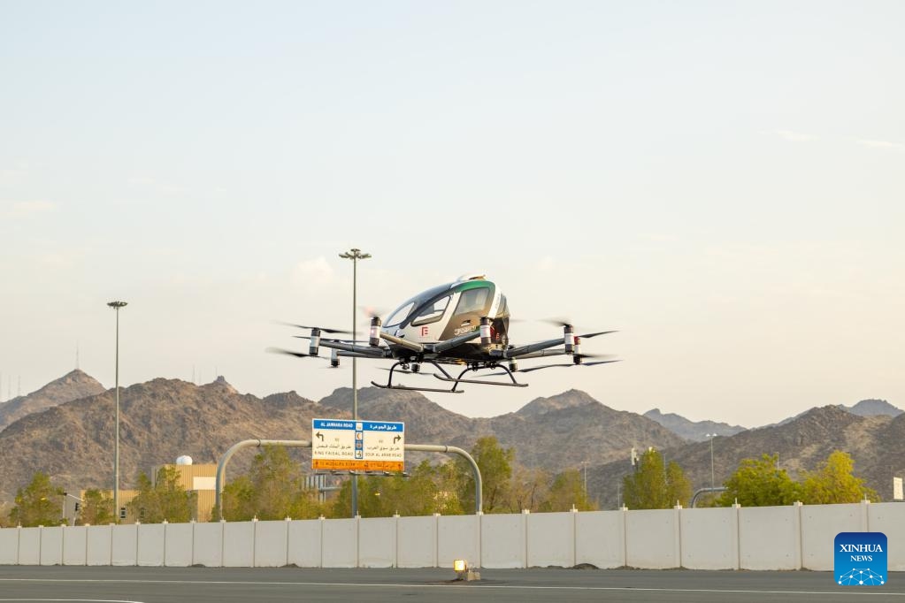 Photo taken on June 12, 2024 shows an unmanned air taxi during a test trial in Mecca, Saudi Arabia. Saudi and Chinese companies have carried out a successful test trial of the first unmanned air taxi in Mecca, Saudi Arabia. The demonstration was carried out on Wednesday by the Front End Limited Company, a Saudi firm specializing in integrating advanced technology across various sectors, in partnership with EHang, a Chinese autonomous aerial vehicle technology platform company.(Photo: Xinhua)