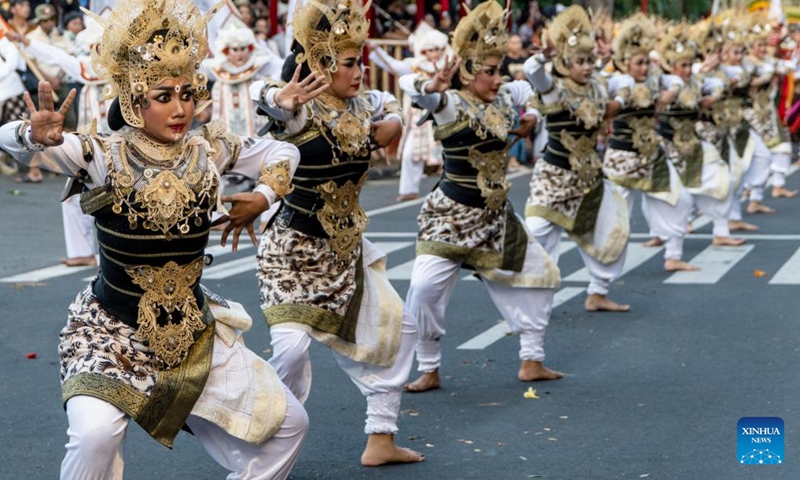 Performers parade during the Bali Arts Festival 2024 in Denpasar, Bali, Indonesia, June 15, 2024. This year's Bali Arts Festival is held from June 15 to July 13. (Xinhua/Lin Shanchuan)