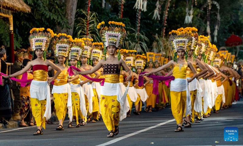Performers parade during the Bali Arts Festival 2024 in Denpasar, Bali, Indonesia, June 15, 2024. This year's Bali Arts Festival is held from June 15 to July 13. (Xinhua/Lin Shanchuan)