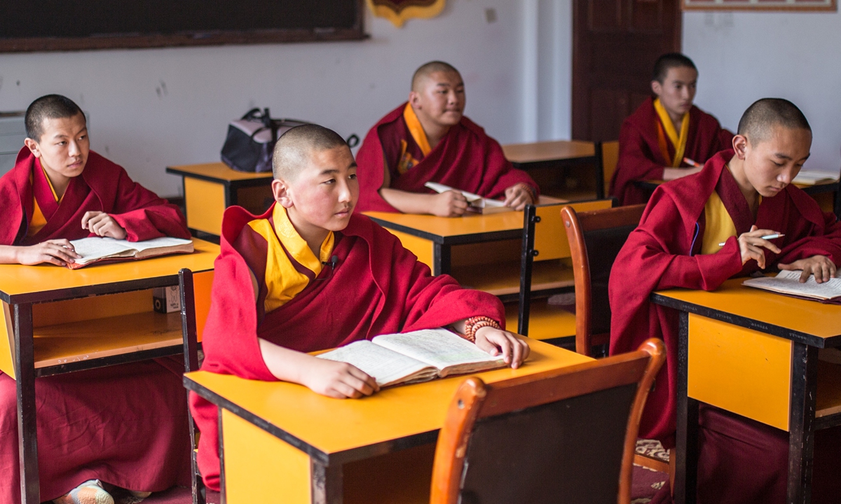 From far left to right: Monks in the Xizang Buddhism Academy enjoy a basketball game in October, 2023. Photo: Shan Jie/GT