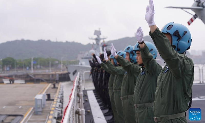Crew members of Chinese People's Liberation Army (PLA) Navy hospital ship Peace Ark wave good-bye at a port in Zhoushan, east China's Zhejiang Province, June 16, 2024. The Chinese People's Liberation Army (PLA) Navy hospital ship Peace Ark set sail from a military port in Zhoushan in east China's Zhejiang Province on Sunday morning for Mission Harmony-2024. (Photo: Xinhua)