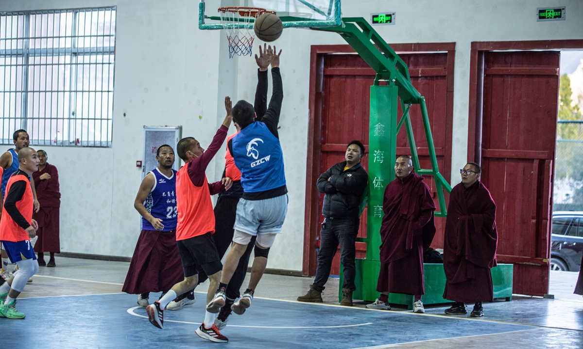 From far left to right: Monks in the Xizang Buddhism Academy enjoy a basketball game in October, 2023. Photo: Shan Jie/GT