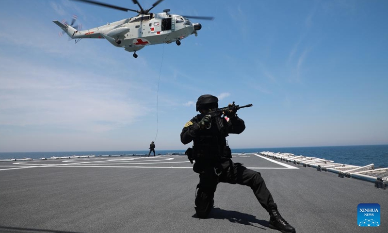 A crew member of Chinese People's Liberation Army (PLA) Navy hospital ship Peace Ark is pictured during a tactics training session before setting sail for the Mission Harmony-2024, on June 1, 2024.  (Photo: Xinhua)