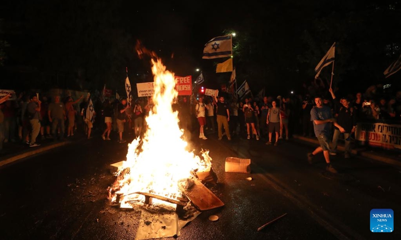 People attend a protest calling for an immediate ceasefire between Israel and Hamas in the Gaza Strip, in Jerusalem, on June 17, 2024.(Photo: Xinhua) 