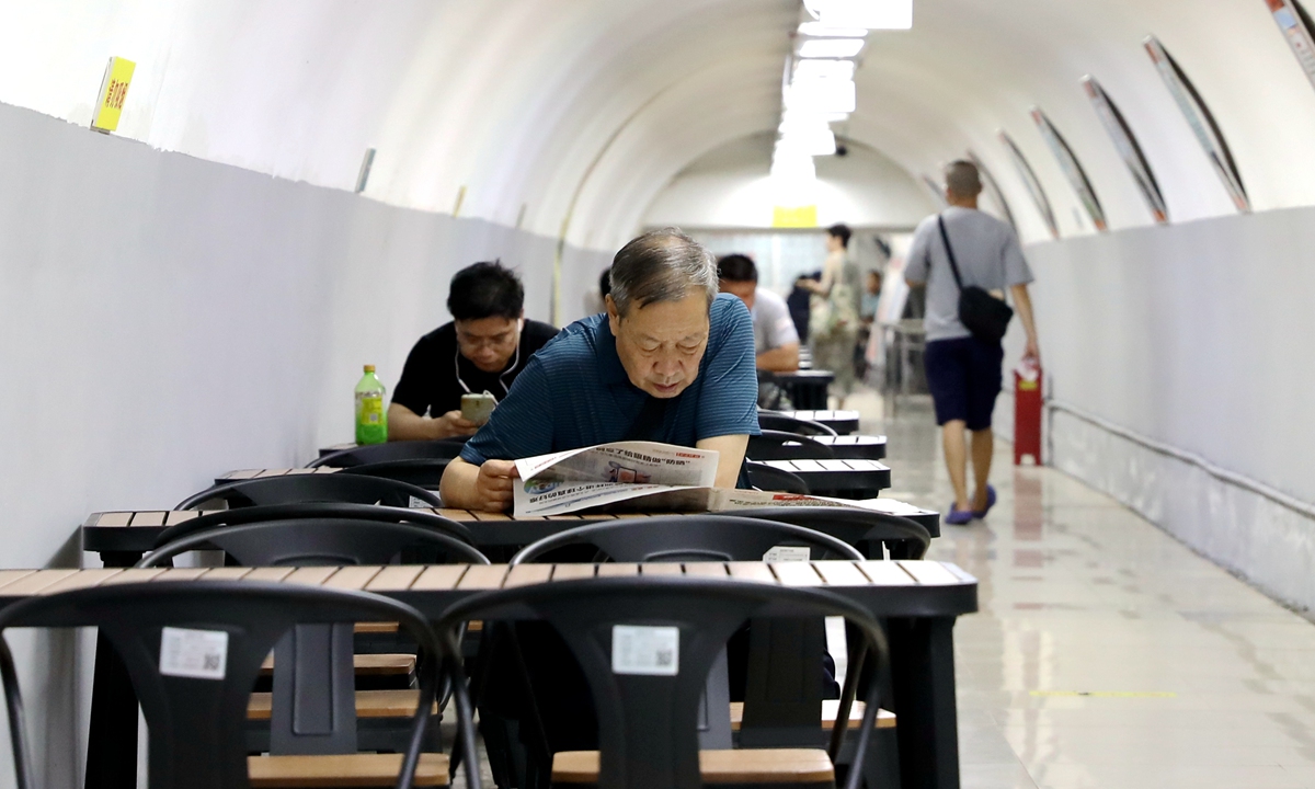 Local residents seek shade and have a rest in an air-raid shelter in Xi'an, Northwest China's Shaanxi Province on June 19, 2024. Photo: VCG