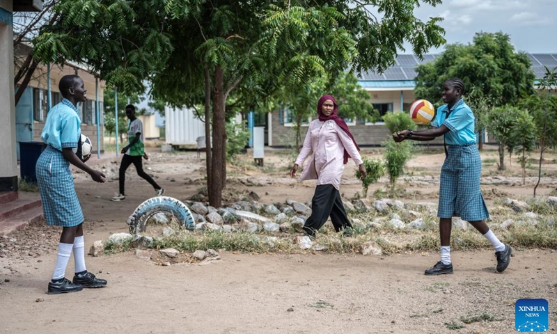 Students play volleyball at Lifeworks Tumaini Girls Secondary School at Kakuma refugee camp in Turkana, Kenya, June 18, 2024. The school was established in 2014 and supported by UNHCR and the government of Kenya. There are more than 300 students from ten countries, including South Sudan, Ethiopia, Somalia, the Democratic Republic of the Congo and Kenya (Photo: Xinhua)
