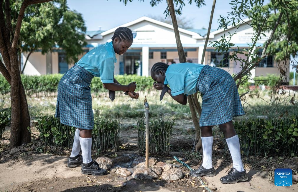 Students wash their faces at Lifeworks Tumaini Girls Secondary School at Kakuma refugee camp in Turkana, Kenya, June 18, 2024. The school was established in 2014 and supported by UNHCR and the government of Kenya. There are more than 300 students from ten countries, including South Sudan, Ethiopia, Somalia, the Democratic Republic of the Congo and Kenya.(Photo: Xinhua)