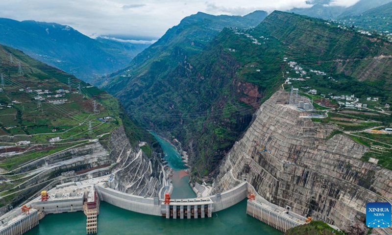 An aerial drone photo taken on June 19, 2024 shows a view of the Baihetan hydropower station in southwest China. Riding on the Jinsha River, the upper section of the Yangtze River, at the provincial border between Sichuan and Yunnan, the Baihetan hydropower station has a total installed capacity of 16 million kilowatts, second only to the Three Gorges Dam project.(Photo: Xinhua)