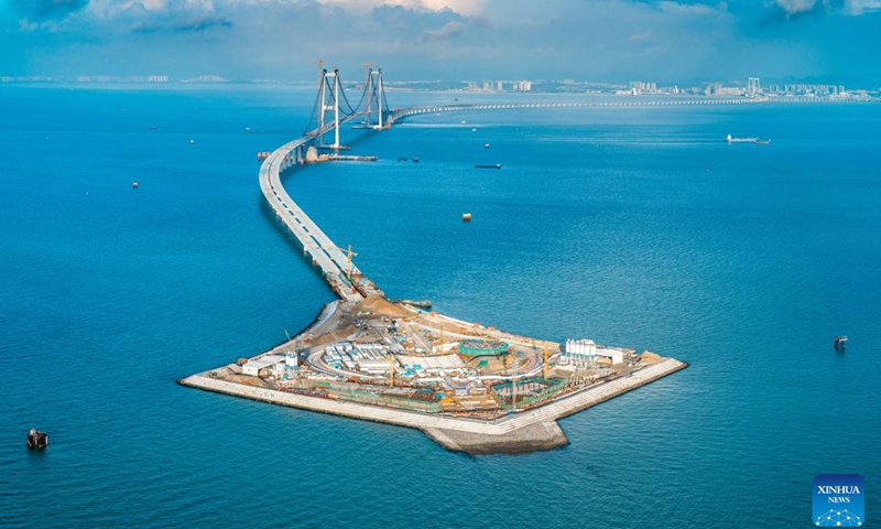 An aerial drone photo taken on June 20, 2023 shows the west artificial island of the Shenzhen-Zhongshan link under construction in south China's Guangdong Province. 