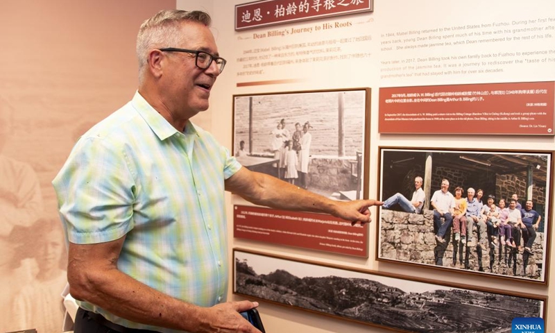 A descendant of Dean Billing's family from the United States points at himself in a photo at Kuliang Families Story Museum in Kuliang, Fuzhou, southeast China's Fujian Province, June 22, 2024. Kuliang, or Guling in Mandarin, is situated on the outskirts of Fuzhou. Since 1886, people from more than 20 countries began to build villas in Yixia Village in Kuliang to spend the summer. (Photo: Xinhua)