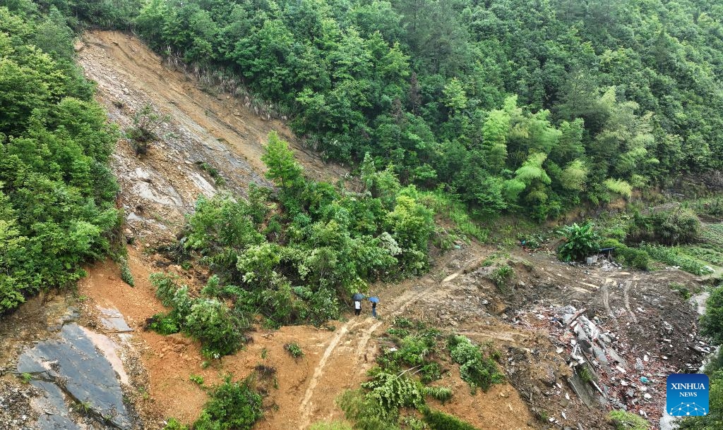 An aerial drone photo taken on June 24, 2024 shows the site of a landslide in Yikeng Village, Xiushui County of Jiujiang, east China's Jiangxi Province. Heavy rainfall hit Jiangxi Province recently.(Photo: Xinhua)
