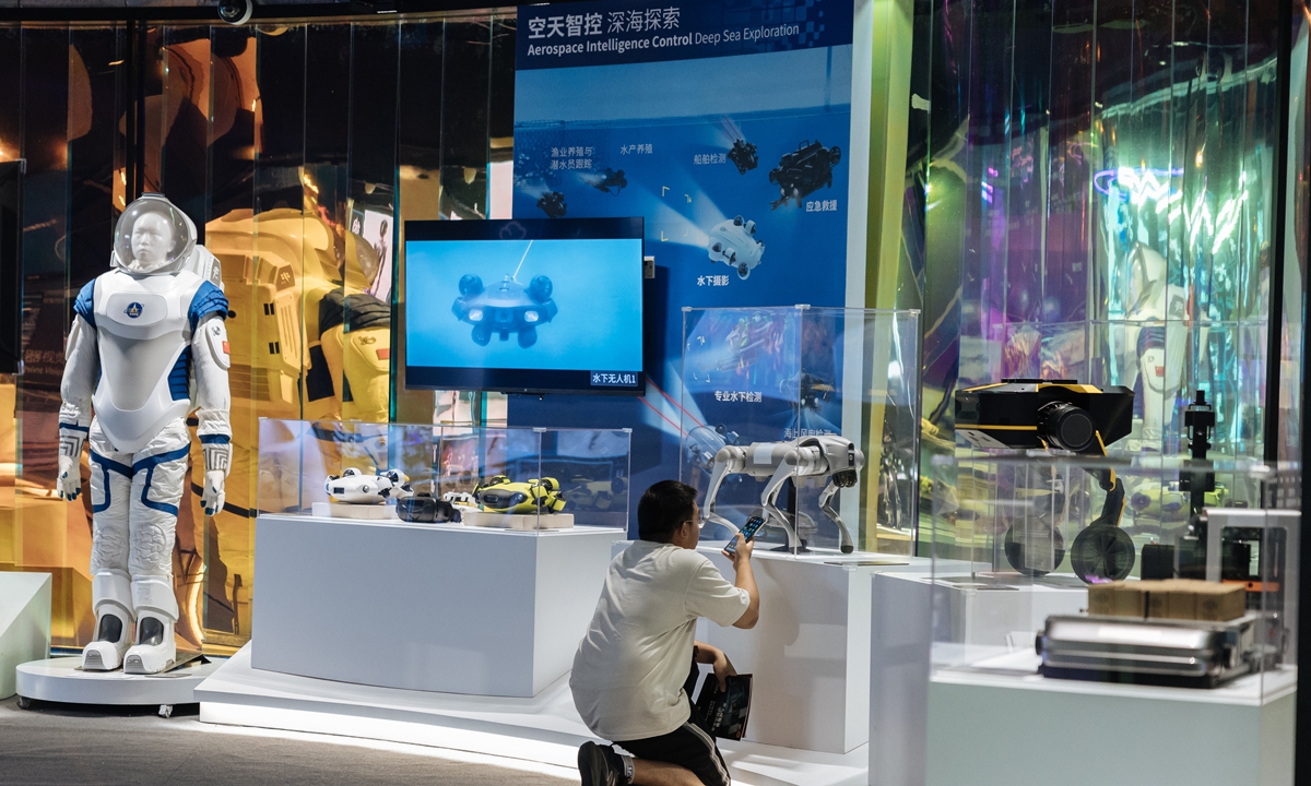 A visitor explores the Special Exhibition on Design Intelligence and High Quality Development in Beijing on June 30, 2024. Photo: Li Hao/GT