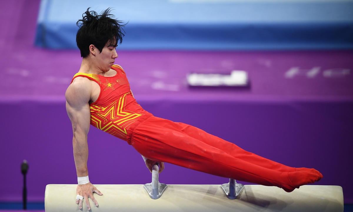 Chinese gymnast Zhang Boheng competes during the pommel horse final at the Hangzhou Asian Games on September 28, 2023. Photo: IC