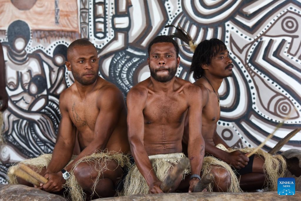 People play drums at the national museum in Port Vila, Vanuatu, June 30, 2024. (Photo: Xinhua)