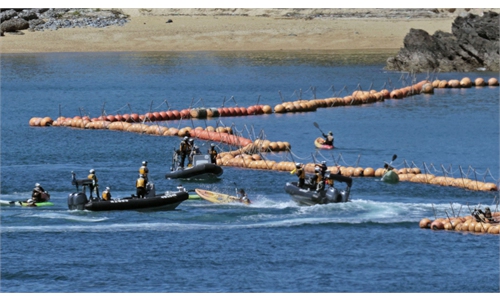 Protesting against US military relocation - Global Times