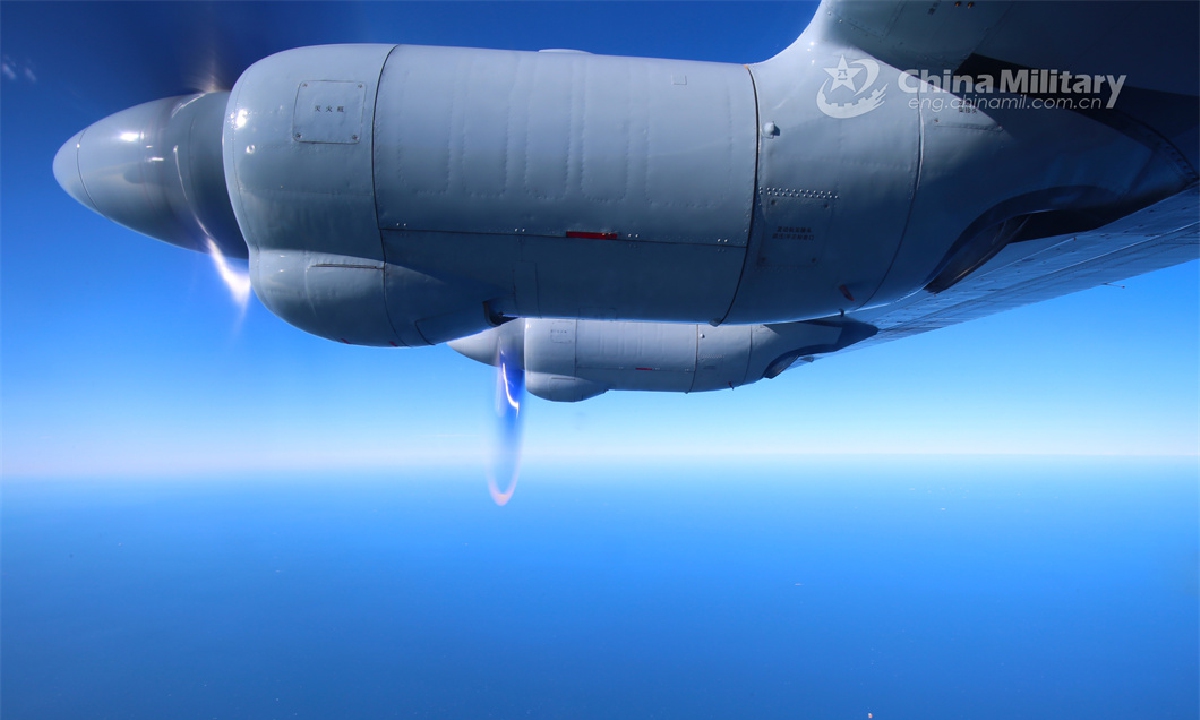 A reconnaissance aircraft attached to a PLA naval aviation regiment patrols in the sky during a round-the-clock flight training exercise. (eng.chinamil.com.cn/Photo by Ge Qihao)