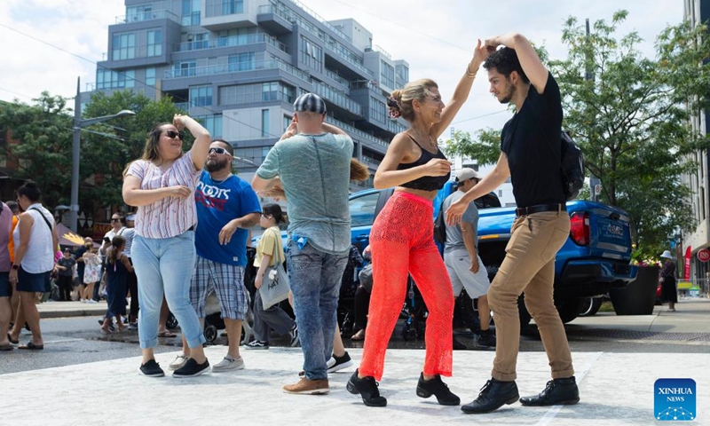 People dance during the 2024 Salsa on St. Clair Street Festival in Toronto, Canada, July 6, 2024. The two-day event, showcasing Latin American cultures, kicked off here on Saturday. Photo: Xinhua