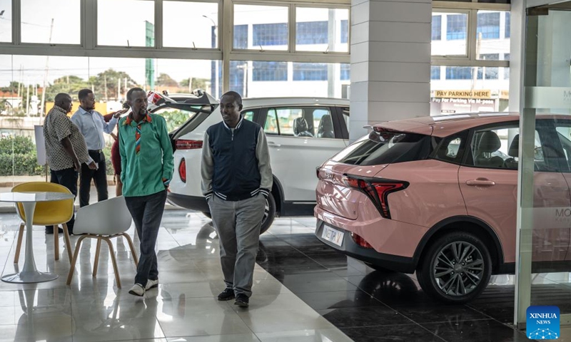 Customers visit a store of Chinese automotive brand Neta in Nairobi, Kenya, July 5, 2024. Chinese automotive brand Neta announced its entry into the Kenyan market on June 26, 2024. (Xinhua/Wang Guansen)