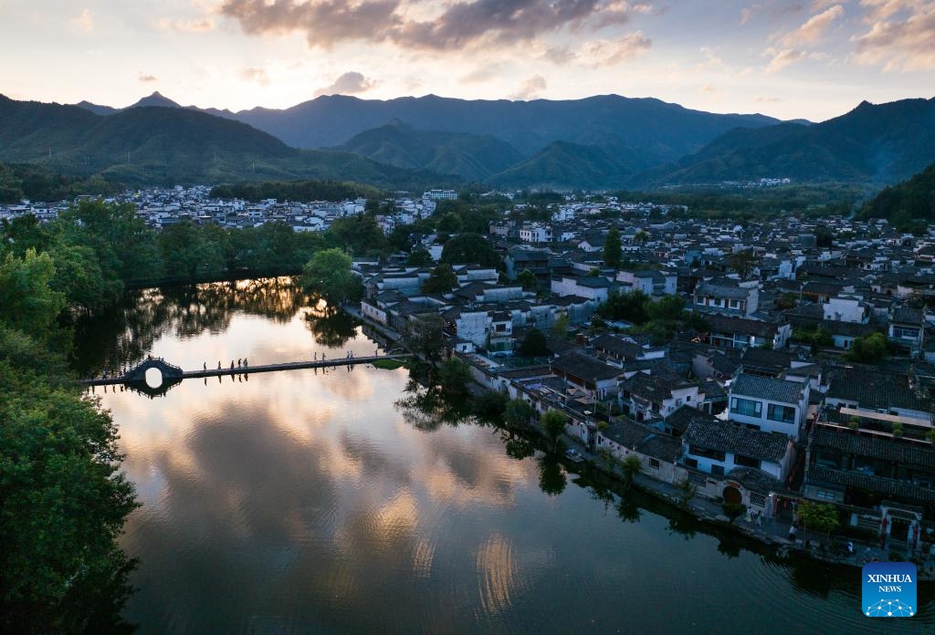 An aerial drone photo taken on July 7, 2024 shows a sunset view in Hongcun Village of Yixian County, east China's Anhui Province. (Photo: Xinhua)