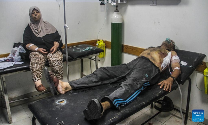 People injured in Israeli attacks are treated at a hospital in the north of Gaza City, on July 8, 2024. Hamas has made urgent contacts with mediators, warning that the Israeli attacks across the Gaza Strip would return the ceasefire negotiating process to point zero, the movement said on Monday. (Photo: Xinhua)
