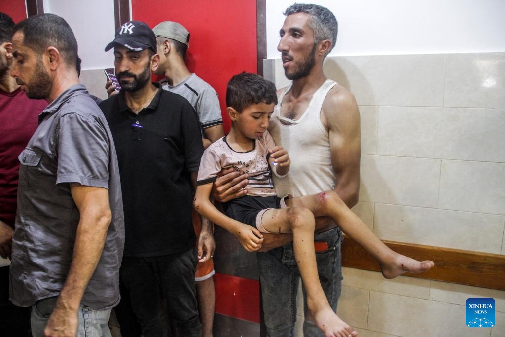 A boy injured in an Israeli attack is seen at a hospital in the north of Gaza City, on July 8, 2024. Hamas has made urgent contacts with mediators, warning that the Israeli attacks across the Gaza Strip would return the ceasefire negotiating process to point zero, the movement said on Monday. (Photo: Xinhua)